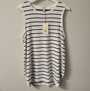 Cream color sleeveless shirt with black stripes